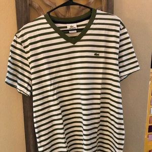 2 Lacoste Shirts boys L/6. NWOT green stripe.